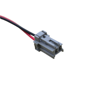 Electrical connector with red and black wires on a white background
