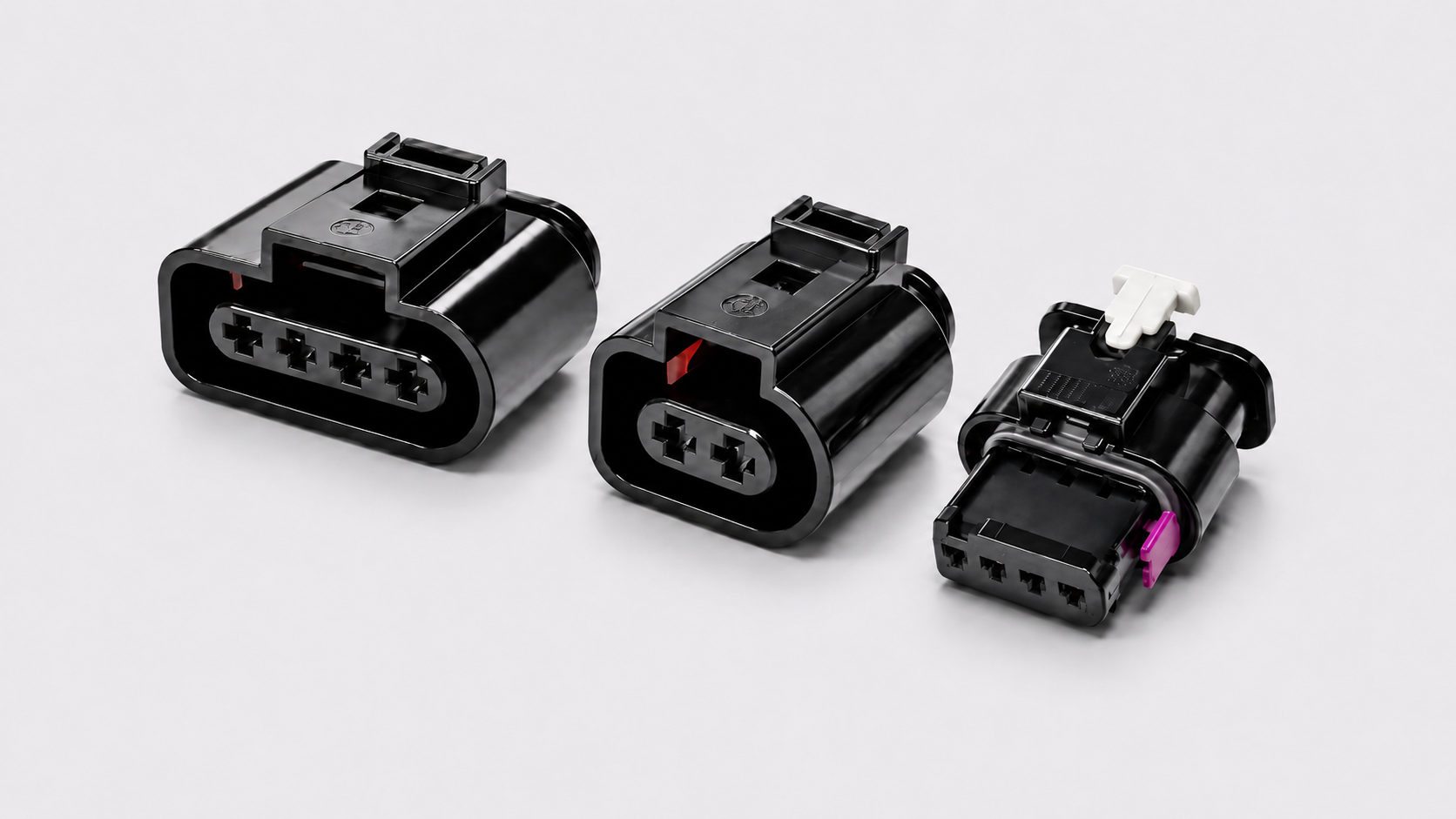 Black automotive wiring connector plugs